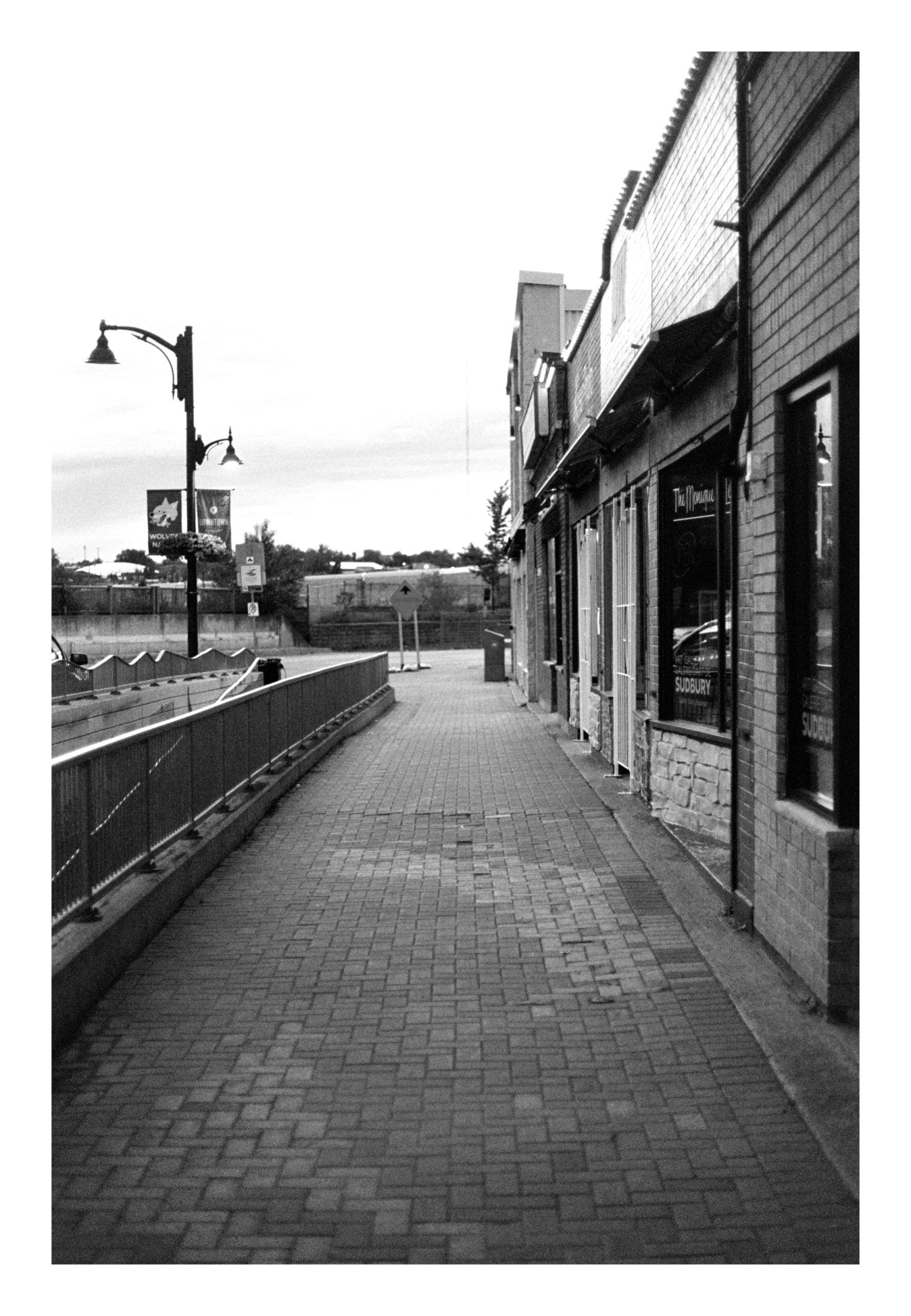 Downtown sidewalk black and white