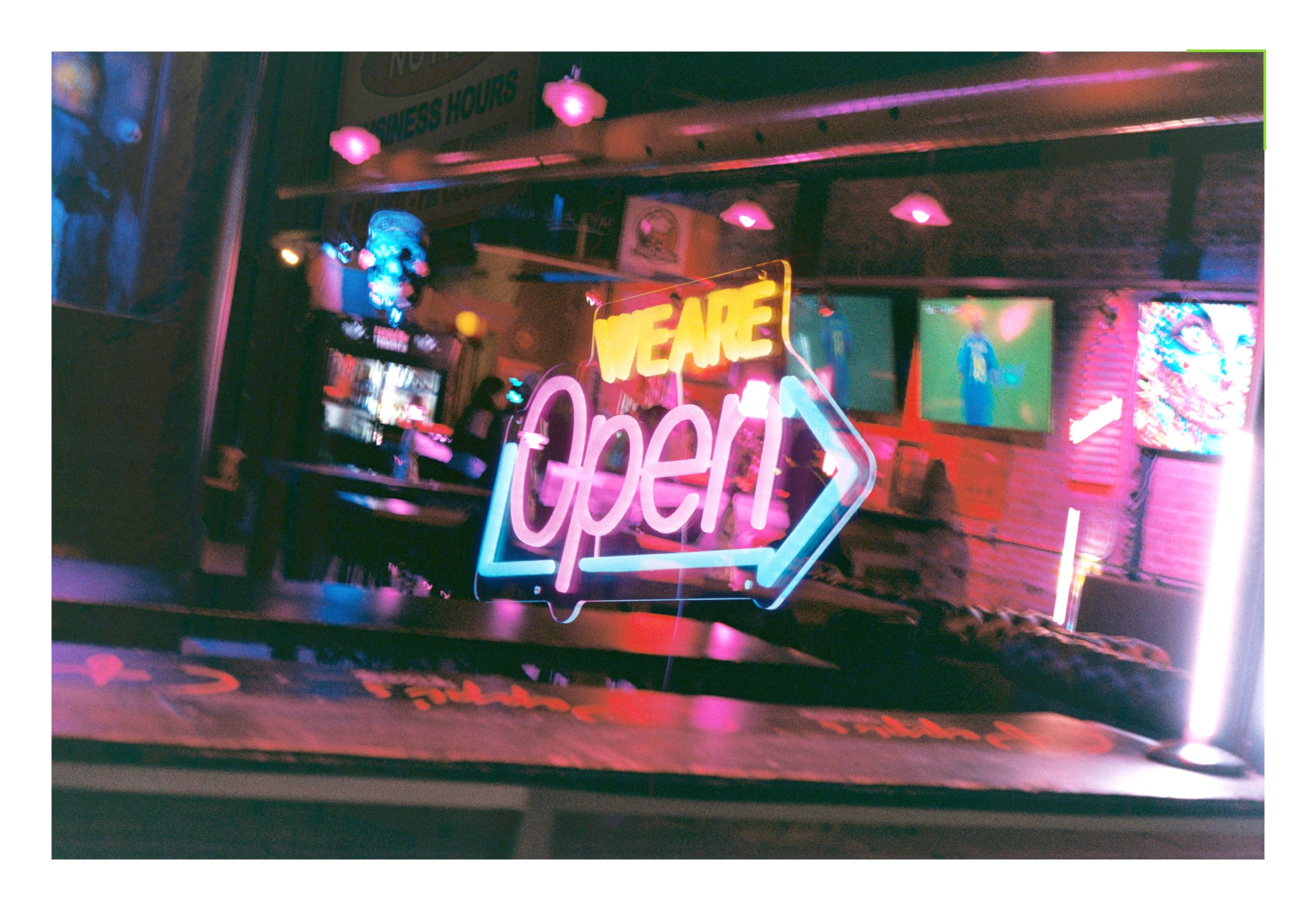 Neon open sign through glass on 35mm film