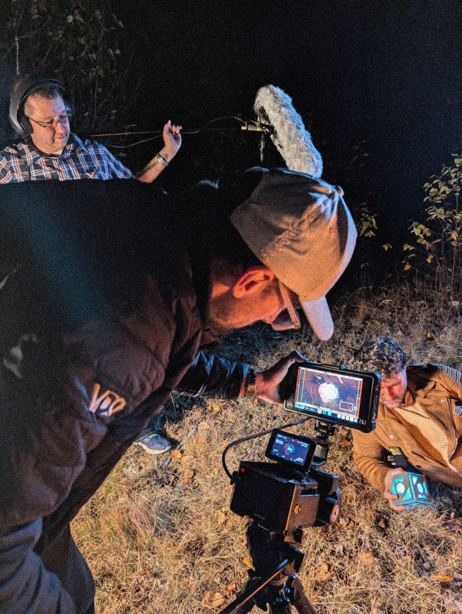 Brandon directing through a camera monitor