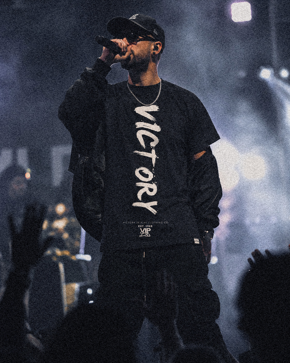 Rapper performing on stage with VIP