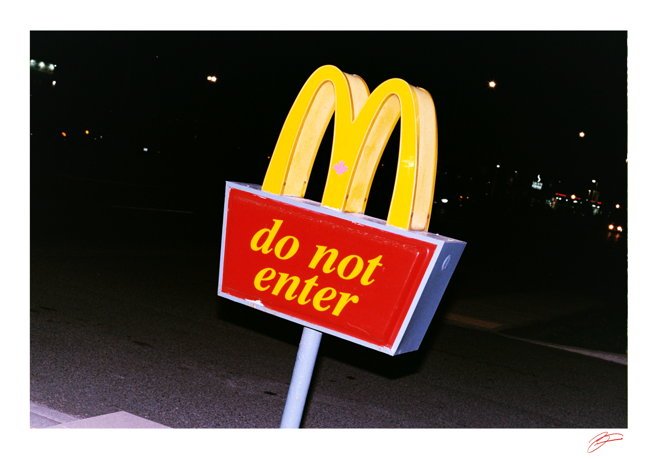 Do not enter sign beneath the McDonald's arches